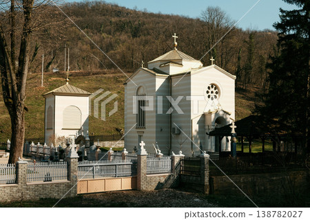 Orthodox church building of Ribnica Monastery in peaceful rural landscape near Mionica Serbia. Historic religious architecture representing faith spirituality heritage culture and pilgrimage tourism Orthodox church building of Ribnica Monastery in peaceful rural landscape near Mionica Serbia. Historic religious architecture representing faith spirituality heritage culture and pilgrimage tourism 138782027