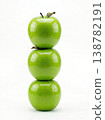 Geometric Stack of Three Different Green Apples with Stems Isolated on a Solid White Background 138782191