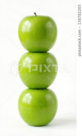 Geometric Stack of Three Different Green Apples with Stems Isolated on a Solid White Background 138782205