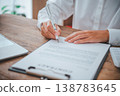 businessman is negotiating, advising, and explaining the matter of the contract to be agreed to sign the contract. 138783645