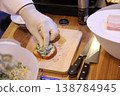 Adding Black Pepper 138784945