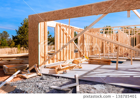 Construction site wooden framing, building materials, tools in during framework 138785401
