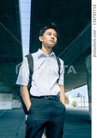 Portrait of a male student looking towards the future Portrait of a male student looking towards the future 138785718