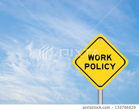 Yellow transportation sign with word work policy on blue color sky background Yellow transportation sign with word work policy on blue color sky background 138786829