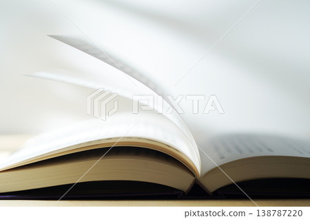 Opening a book (image) Opening a book (image) 138787220