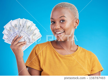 Black woman, cash fan and finance, portrait and happy with prize, loan and dollars isolated on blue background. Money, cashback and lottery win with payment, financial freedom and bills in studio 138787483