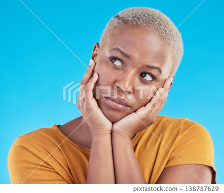 Thinking, sad and black woman with depression, decision or solution on a blue studio background. Person, alone or model with problem solving, thoughts or anxiety with mental health, unhappy or choice Thinking, sad and black woman with depression, decision or solution on a blue studio background. Person, alone or model with problem solving, thoughts or anxiety with mental health, unhappy or choice 138787629