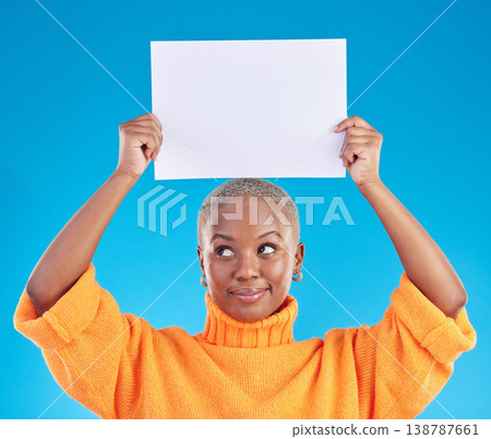 Black woman, blank poster and studio with thinking, mockup space and smile with ideas by blue background. African gen z girl, student and paper billboard for promotion, branding and choice for deal Black woman, blank poster and studio with thinking, mockup space and smile with ideas by blue background. African gen z girl, student and paper billboard for promotion, branding and choice for deal 138787661