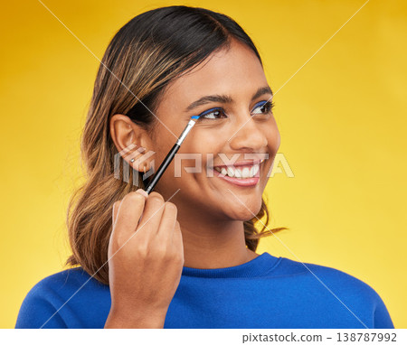 Woman, makeup and brush with skincare, thinking or self care on a yellow studio background. Female person, smile or model with cosmetic tool, luxury or foundation with mindset, aesthetic or eyeshadow Woman, makeup and brush with skincare, thinking or self care on a yellow studio background. Female person, smile or model with cosmetic tool, luxury or foundation with mindset, aesthetic or eyeshadow 138787992