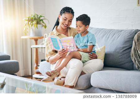 Book, reading and mother with kid on sofa for storytelling in living room of happy home, teaching and bonding fun. Love, learning and mom with child, fantasy story on couch and quality time together. 138788009