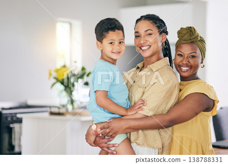 LGBT, kid and happy couple hug, portrait and smile for family solidarity, home support or enjoy quality time together. Love, hugging and gay people, mothers or lesbian women with adopted child in USA LGBT, kid and happy couple hug, portrait and smile for family solidarity, home support or enjoy quality time together. Love, hugging and gay people, mothers or lesbian women with adopted child in USA 138788331