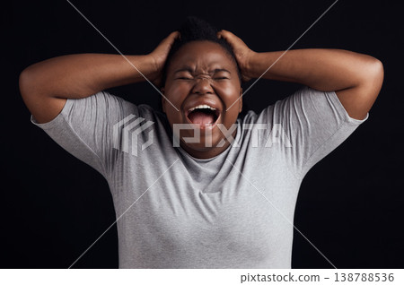 Anger, frustrated and black woman screaming, depression and mental health on a dark black studio background. Person, emotion and model shouting, anxiety and angry with grief, moody and lose control Anger, frustrated and black woman screaming, depression and mental health on a dark black studio background. Person, emotion and model shouting, anxiety and angry with grief, moody and lose control 138788536