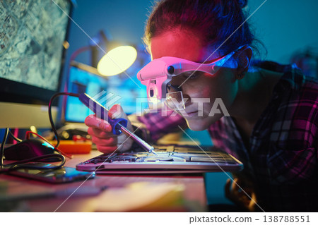 Engineer woman, motherboard and soldering iron for manufacturing, microchip and it development. Information technology, circuit board and electronics for programming, hardware and system with tools Engineer woman, motherboard and soldering iron for manufacturing, microchip and it development. Information technology, circuit board and electronics for programming, hardware and system with tools 138788551