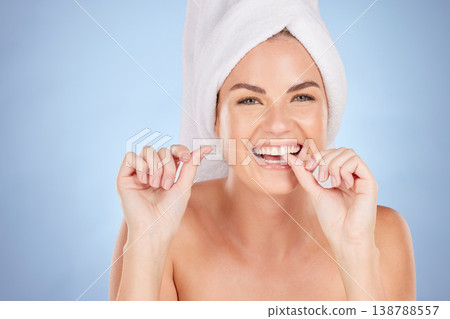 Dental, portrait and happy woman floss teeth for morning self care, bathroom routine or gum protection. Tooth enamel care, face and person cleaning mouth for oral hygiene health on studio background 138788557