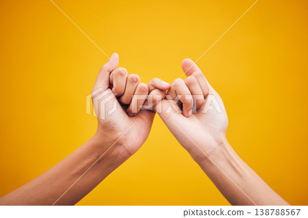 People, hands and pinky promise in studio with trust, help or hope for reconciliation on yellow background. Finger, emoji and deal by friends with secret, gesture and support expression or solidarity People, hands and pinky promise in studio with trust, help or hope for reconciliation on yellow background. Finger, emoji and deal by friends with secret, gesture and support expression or solidarity 138788567