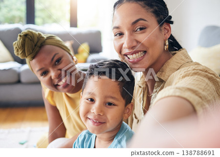 Lesbian, women and boy in family selfie, smile and care with portrait, post and web blog on floor in home living room. Mother, male kid and happy for love, bonding or memory for social media in house Lesbian, women and boy in family selfie, smile and care with portrait, post and web blog on floor in home living room. Mother, male kid and happy for love, bonding or memory for social media in house 138788691