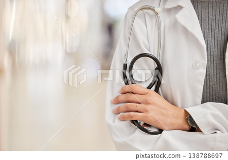 Hands, doctor and person with arms crossed, stethoscope and health insurance in hospital. Closeup of medical surgeon, cardiology expert and woman consulting for healthcare services on mockup space 138788697