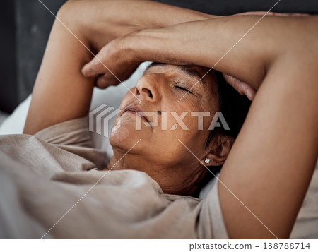 Sleeping, headache and senior woman in home bedroom with fatigue, tired or exhausted. Depression, insomnia and elderly person in bed with pain, stress and problem, anxiety or crisis in retirement Sleeping, headache and senior woman in home bedroom with fatigue, tired or exhausted. Depression, insomnia and elderly person in bed with pain, stress and problem, anxiety or crisis in retirement 138788714