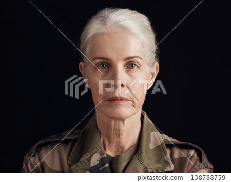 Soldier, studio portrait and senior woman of military service, battle warrior or Ukraine war hero, leader or navy veteran. Army pride, security and face of elderly person isolated on black background Soldier, studio portrait and senior woman of military service, battle warrior or Ukraine war hero, leader or navy veteran. Army pride, security and face of elderly person isolated on black background 138788759