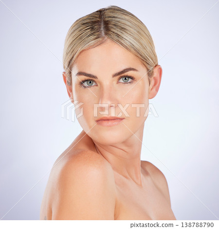 Portrait, skincare and woman in studio for cosmetic, treatment and natural skin wellness on grey background. Face, beauty and female model relax with dermatology result satisfaction and confidence Portrait, skincare and woman in studio for cosmetic, treatment and natural skin wellness on grey background. Face, beauty and female model relax with dermatology result satisfaction and confidence 138788790
