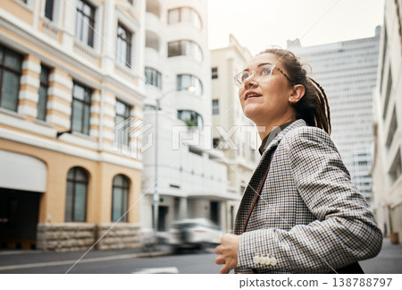 Professional woman in city, travel and commute to work with buildings, motion blur and waiting for taxi cab. Corporate female person in urban street, business clothes and journey to workplace Professional woman in city, travel and commute to work with buildings, motion blur and waiting for taxi cab. Corporate female person in urban street, business clothes and journey to workplace 138788797