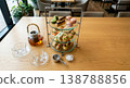A luxurious afternoon tea set to enjoy at a cafe or hotel: an image of a three-tiered stand and tea. 138788856