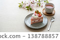 Cherry blossom cake and warm tea to evoke the feeling of spring's arrival. A beautiful tea time adorned with cherry blossoms. 138788857