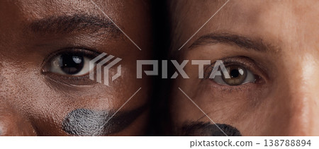 Eyes, diversity and empowerment with women closeup in studio for human rights or gender equality. Portrait, face and courage with confident female people in a politics protest of violence together Eyes, diversity and empowerment with women closeup in studio for human rights or gender equality. Portrait, face and courage with confident female people in a politics protest of violence together 138788894