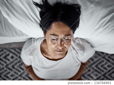 Old woman, depression and mental health, life crisis and psychology with grief and loss, sad and tired at home. Top view of female person, depressed with fatigue and burnout, retirement and pain 138788901