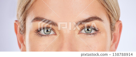Beauty, studio portrait or eyes of woman for eyesight care, optical vision or natural cosmetics, wellness or eyebrow routine. Skincare face, eyelash or closeup person with makeup on purple background 138788914