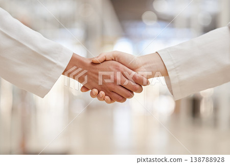 Doctors, partnership and handshake for collaboration, agreement and teamwork. Shaking hands, medical professional and people in cooperation for healthcare, wellness and thank you, welcome and success Doctors, partnership and handshake for collaboration, agreement and teamwork. Shaking hands, medical professional and people in cooperation for healthcare, wellness and thank you, welcome and success 138788928