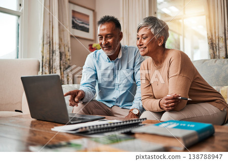 Mature couple, sofa and laptop for planning finance, retirement funding and investment or asset management at home. Elderly people or man and woman reading information on computer for pension savings Mature couple, sofa and laptop for planning finance, retirement funding and investment or asset management at home. Elderly people or man and woman reading information on computer for pension savings 138788947