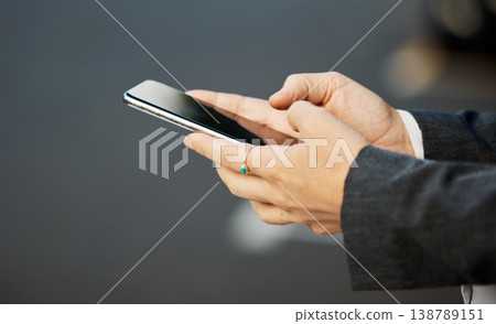 Phone, hands and woman texting in a city street for travel, location and internet, search or tracking closeup. Hand holding, smartphone and female checking social media, app or email on town commute 138789151