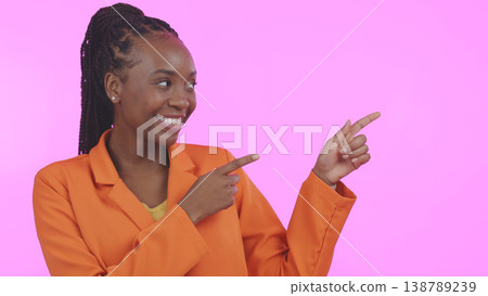 Black woman, pointing and advertising presentation with information or news, smile with presenter on pink background. Mockup, launch announcement with marketing ads and coming soon in a studio 138789239