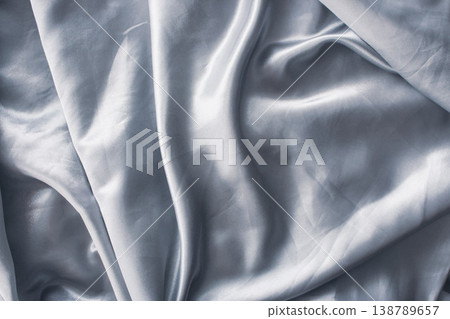 Silk grey sheet background. Luxury bedding concept. Elegant bedsheet. Satin bed blanket background with copy space. Sleeping comfort zone. Soft sofa decor with foil. Home design. Fabric background. 138789657
