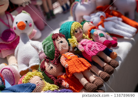 Handmade Colorful Amigurumi Dolls Displayed at Market Stall Handmade Colorful Amigurumi Dolls Displayed at Market Stall 138789690