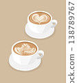 Latte art coffee cup with heart and rosette design on a beige background. 138789767