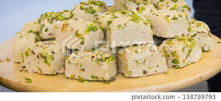 Halva with pistachio and vanilla. Traditional balkan dessert Halva with pistachio and vanilla. Traditional balkan dessert 138789793