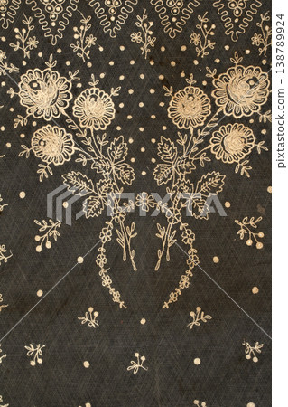 Close up of vintage lace fabric white on black background embroidery 138789924