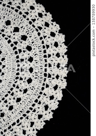 Close up of vintage lace fabric white on black background embroidery Close up of vintage lace fabric white on black background embroidery 138789930