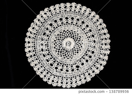 Close up of vintage lace fabric white on black background embroidery Close up of vintage lace fabric white on black background embroidery 138789936