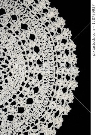 Close up of vintage lace fabric white on black background embroidery Close up of vintage lace fabric white on black background embroidery 138789937