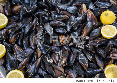 Fresh Mussels with Lemon Slices Background Seafood Texture Fresh Mussels with Lemon Slices Background Seafood Texture 138790215