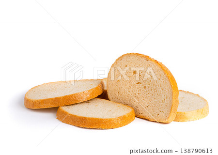 Scattered Bread Slices on White Surface 138790613