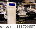 Modern marina power pedestal unit electricity moored yachts visible cables connectors at night. Clean harbor infrastructure luxury boats technical equipment maritime scene calm atmosphere 138790667