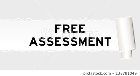 Ripped gray paper background that have word free assessment under torn part 138791049