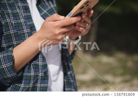 Close up of woman hands using smartphone, mobile communication concept Close up of woman hands using smartphone, mobile communication concept 138791809