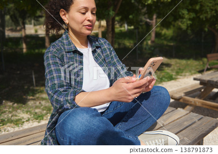 Close Up Woman Hands Using Smartphone Outdoors Close Up Woman Hands Using Smartphone Outdoors 138791873