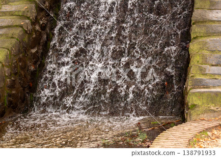 Close-up of the waterfall in the National Park on the Veluwe near Loenen, the Netherlands. Close-up of the waterfall in the National Park on the Veluwe near Loenen, the Netherlands. 138791933