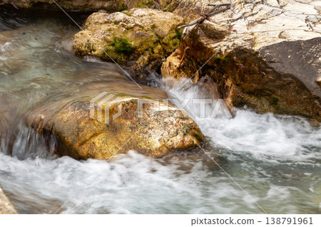 Waterfall at the river the Drau near Ferlach in Carinthia, Austria Waterfall at the river the Drau near Ferlach in Carinthia, Austria 138791961